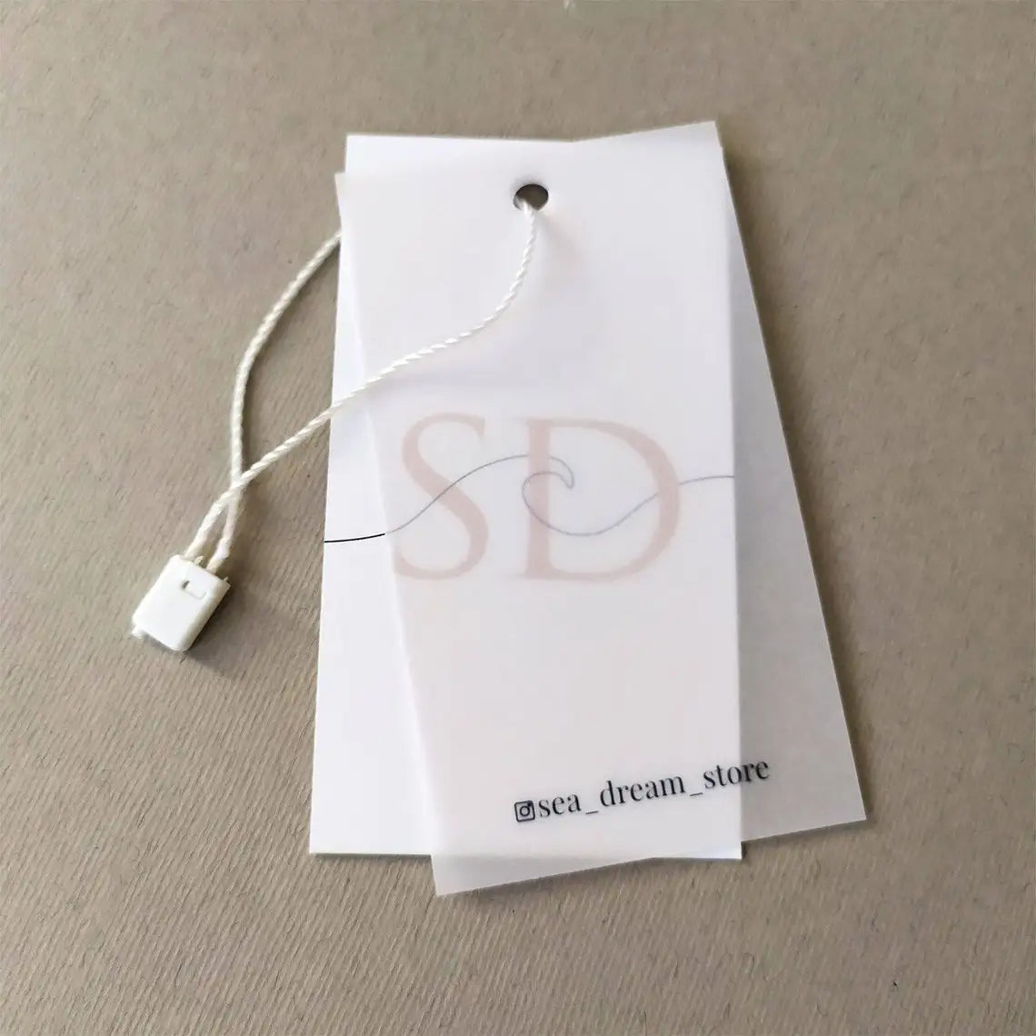 Eco Friendly Wholesale Custom Logo Label  Garment Embossed Swing Spot UV Paper Tags Paper Hang tag With String For Clothes